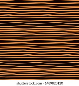 Halloween hand drawn seamless vector pattern with horizontal stripes, orange on a black background. Flat style design. Concept for children textile print, wallpaper, wrapping paper, holiday decor.