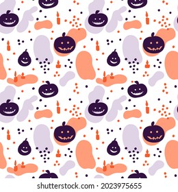 Halloween holiday print with pumpkins jack lantern, candles and spots on the background. Seamless vector pattern for festive fabric and paper.