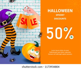 Halloween holiday sale banner with pumpkin happy monster face, purple witch hat, legs with striped stockings, cute smiling spiders and female hand with shopping bags on brick wall background