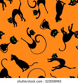 Halloween holiday seamless pattern with cats over orange background for creating Halloween designs.  Vector illustration.