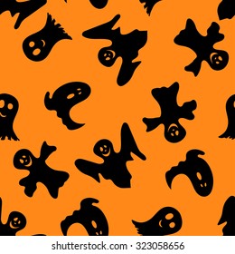 Halloween holiday seamless pattern with smiling ghosts over orange background for creating Halloween designs.  Vector illustration.