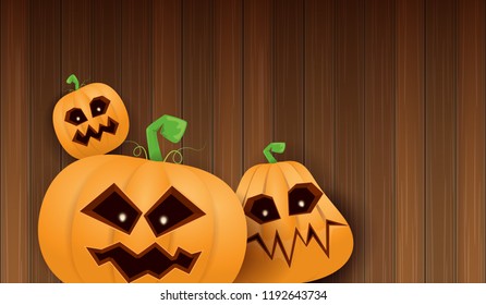 Halloween Horizontal web Banner or poster with Halloween scary pumpkins isolated on wooden wall background. Funky kids Halloween background with space for text