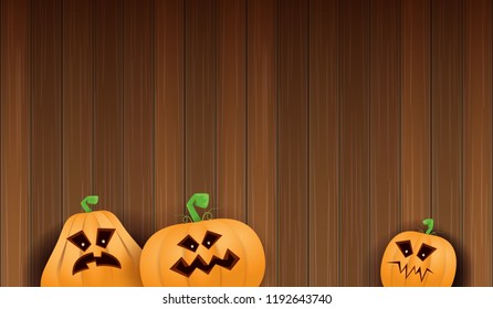 Halloween Horizontal web Banner or poster with Halloween scary pumpkins isolated on wooden wall background. Funky kids Halloween background with space for text