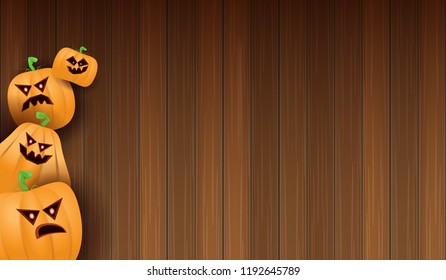 Halloween Horizontal web Banner or poster with Halloween scary pumpkins isolated on wooden wall background. Funky kids Halloween background with space for text