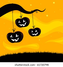 Halloween Jack O'Lantern Tree background. Pumpkin heads hanging from tree branch. Scary halloween background.