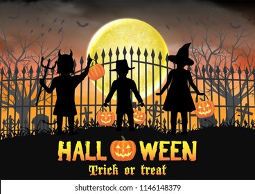halloween kids in front of graveyard cemetery gate