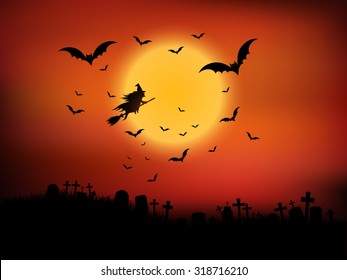 Halloween landscape with witch flying through the air