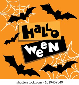 Halloween lettering and bats on an orange background