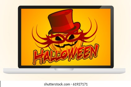 Halloween masked pumpkin in modern laptop