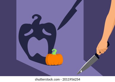 Halloween minimal concept, hand holding menacing knife and scared pumpkin projecting funny spooky shade on background