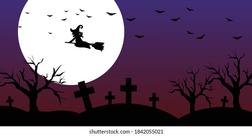 Halloween night with the big full moon, gravestones, dried tree