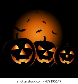 Halloween night with grinning pumpkins background