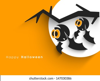 Halloween party banner, poster or background with scary owls and dead tree branch. 