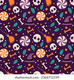 Halloween pattern background with halloween skull and candy on dark background