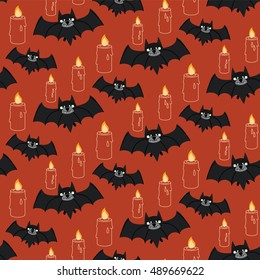 Halloween pattern with bat and candle on the orange background. Vector illustration
