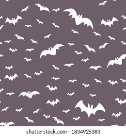 Halloween pattern with flying bats. Vector seamless background. Bat simple illustration texture.