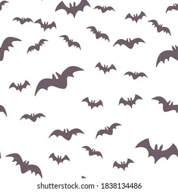 Halloween pattern with flying bats. Vector seamless background. Bat simple illustration texture.