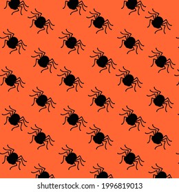 Halloween pattern in the form of a black Spider on an orange background.halloween party decorations