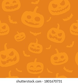 Halloween pattern or pumpkin isolated on orange background. Greeting card or wrapping paper. Halloween background