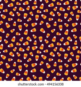 Halloween pattern with small candy corns sweets on dark background. Holiday trick or treat concept. Vector illustration