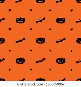 Halloween pattert with bat star smile pumpkin on orange background halloween parth or present gift wrapper 