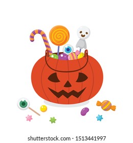 Halloween pumpkin basket with candies on white background