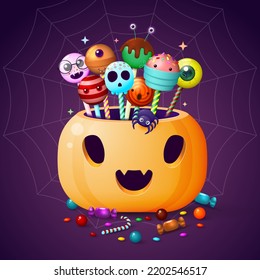 Halloween pumpkin basket full of fun candy treats.