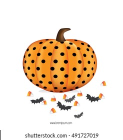 Halloween pumpkin with bat and candy on white background.