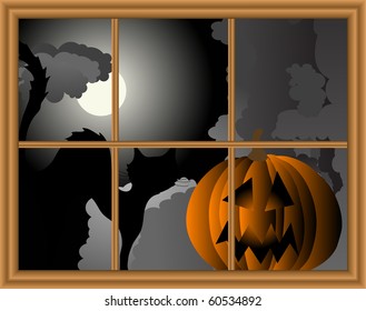 Halloween pumpkin behind the window