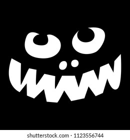 Halloween pumpkin face on a black background