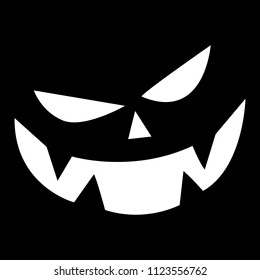 Halloween pumpkin face on a black background