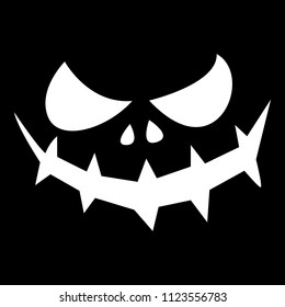 Halloween pumpkin face on a black background