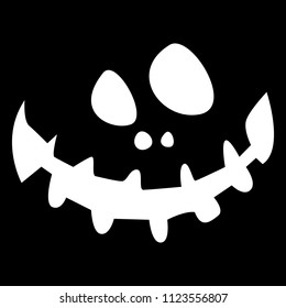 Halloween pumpkin face on a black background