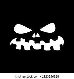 Halloween pumpkin face on a black background