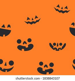 Halloween pumpkin faces seamless pattern. Carved pumpkins texture background.