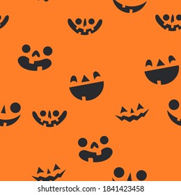 Halloween pumpkin faces seamless pattern. Carved pumpkins texture background.