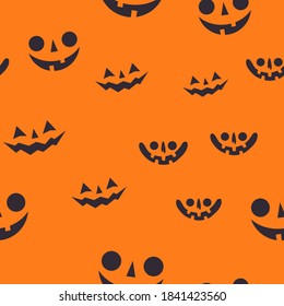 Halloween pumpkin faces seamless pattern. Carved pumpkins texture background.