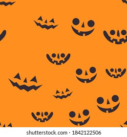 Halloween pumpkin faces seamless pattern. Carved pumpkins texture background.