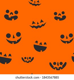 Halloween pumpkin faces seamless pattern. Carved pumpkins texture background.