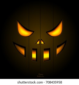 Halloween pumpkin glowing in darkness