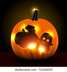 Halloween pumpkin glowing in darkness