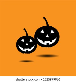 Halloween pumpkin Happy smiling faces on a yellow-orange background