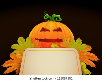 halloween pumpkin lantern with maple leaves and blank place for text