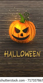 Halloween pumpkin on wood planks background.