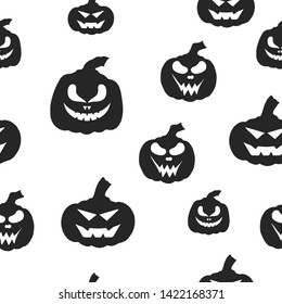 Halloween pumpkin silhouettes pattern with spooky smiling faces. October party scary cartoon seamless background.
