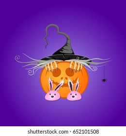 Halloween. Pumpkin. Witch hides behind the pumpkin.