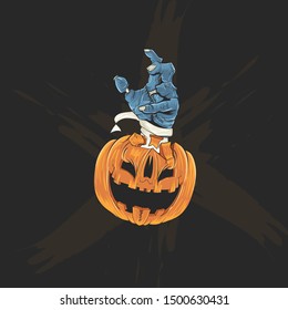 halloween pumpkin with zombie hand