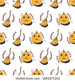 Halloween pumpkins and Broomsticks. Seamless pattern on a white background. Cute vector illustration.