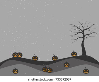 Halloween pumpkins and dead tree on the snowing night.