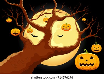 Halloween pumpkins hanging on tree